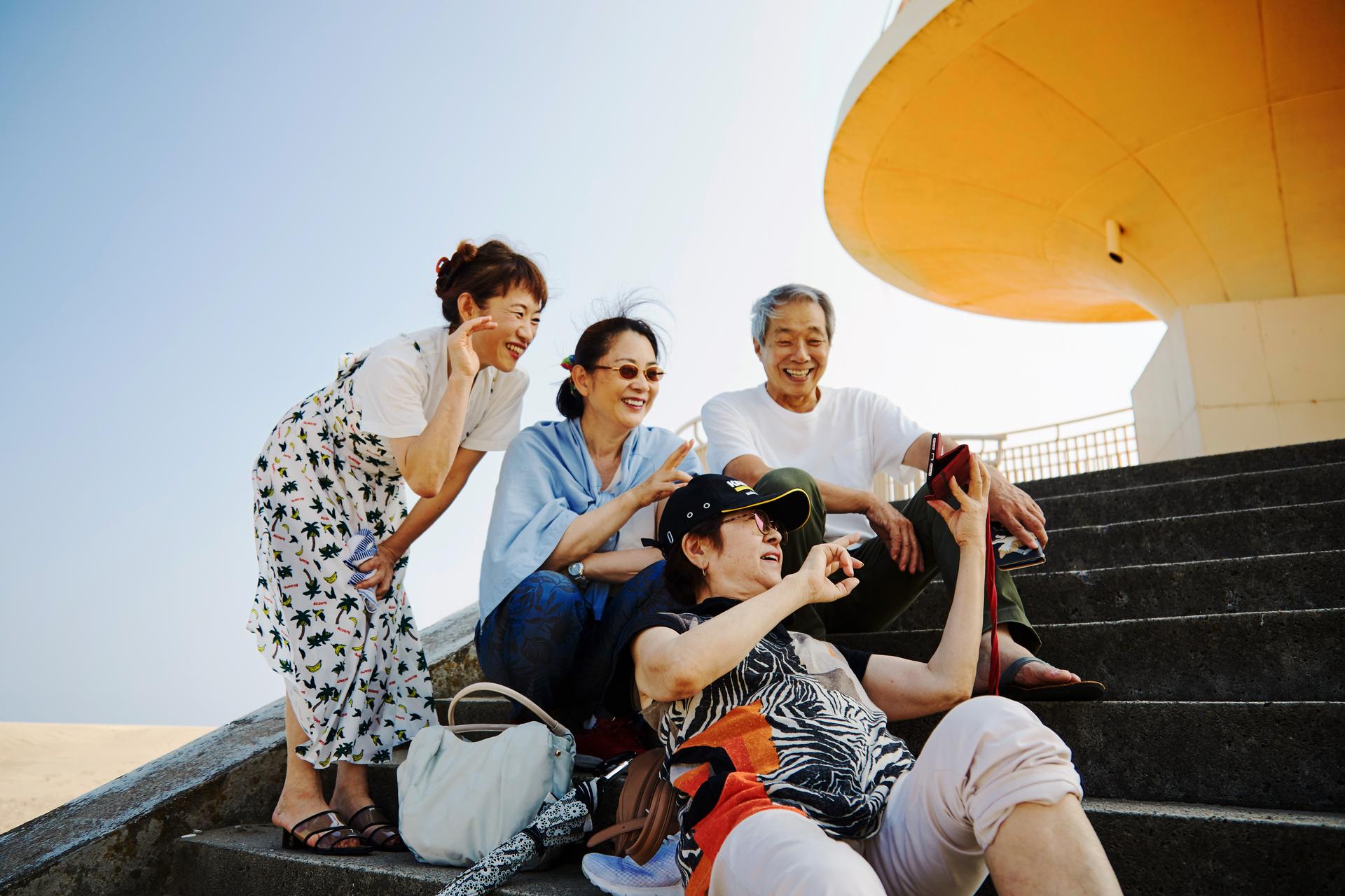 Mature_people_taking_a_selfie_outdoor.jpg